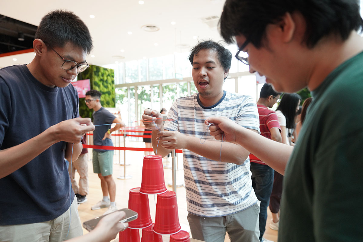 Cup stacking game at Shopee event